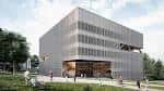 Edificio moderno y angular de la Escuela de Ingeniería Aeronáutica en la Universidad de Vigo, con personas en el exterior