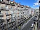 Panorámica aérea de la Calle Progreso con edificios y tráfico