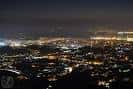 Vista panorámica nocturna de la ciudad de Vigo iluminada desde el Parque Forestal de Beade