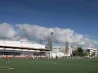 Vista panorámica del Complejo Deportivo de A Xunqueira con campos de fútbol y edificios.