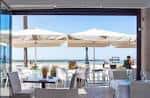 Nuestros platos y el local, con vistas al mar | Quilla, Cádiz