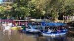 Grupo de barcas con visitantes en el río Mandeo, Betanzos