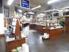 Vista general del interior de la Librería Lume con múltiples pasillos