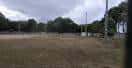 Vista general del campo de fútbol de Nadela con césped y arbolado