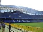 Vista interior de las gradas del Estadio ABANCA-RIAZOR y parte del terreno de juego
