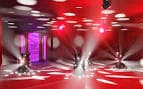 Pista de baile del Horizon Nightclub con intensa iluminación roja y blanca