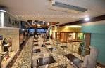 Interior de la zona de cafetería o espacio común en Galerías Durán