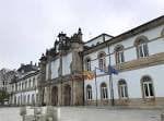 Fachada del Pazo Provincial de San Marcos con banderas en la Praza de Lugo