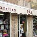 Fachada de la Libraría Paz con toldo y escaparates