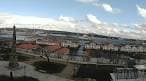 Vista panorámica del puerto de Ferrol y sus edificios bajo un cielo nublado