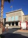 Fachada principal de la Estación Marítima de Vigo con bandera española