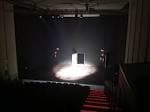 Interior del escenario de la Sala Agustín Magán con iluminación y butacas