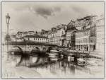 Vista clásica en tono sepia del Puente Viejo de Betanzos y las casas ribereñas