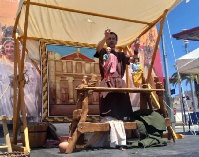 Viatges en el temps | Histories de carrer. Espectaculo de recreacion de titelles romans